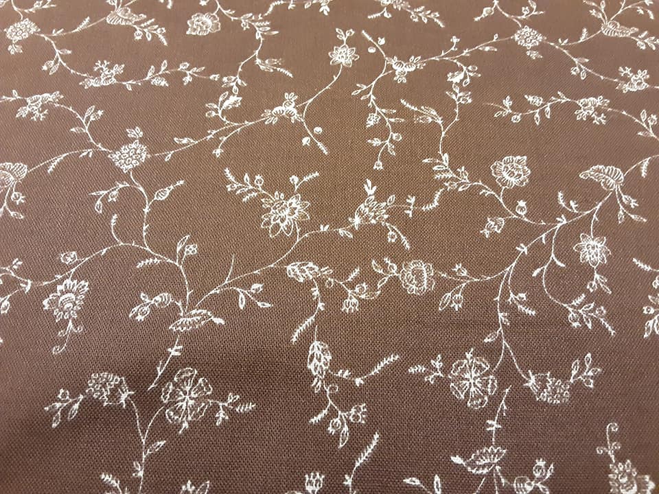 White Flower Outline on Brown