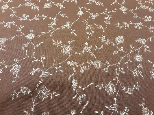 White Flower Outline on Brown